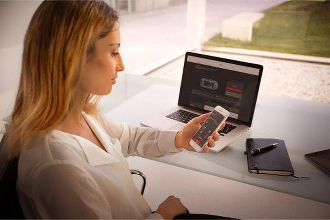 Customer shopping for a Porsche online on a laptop