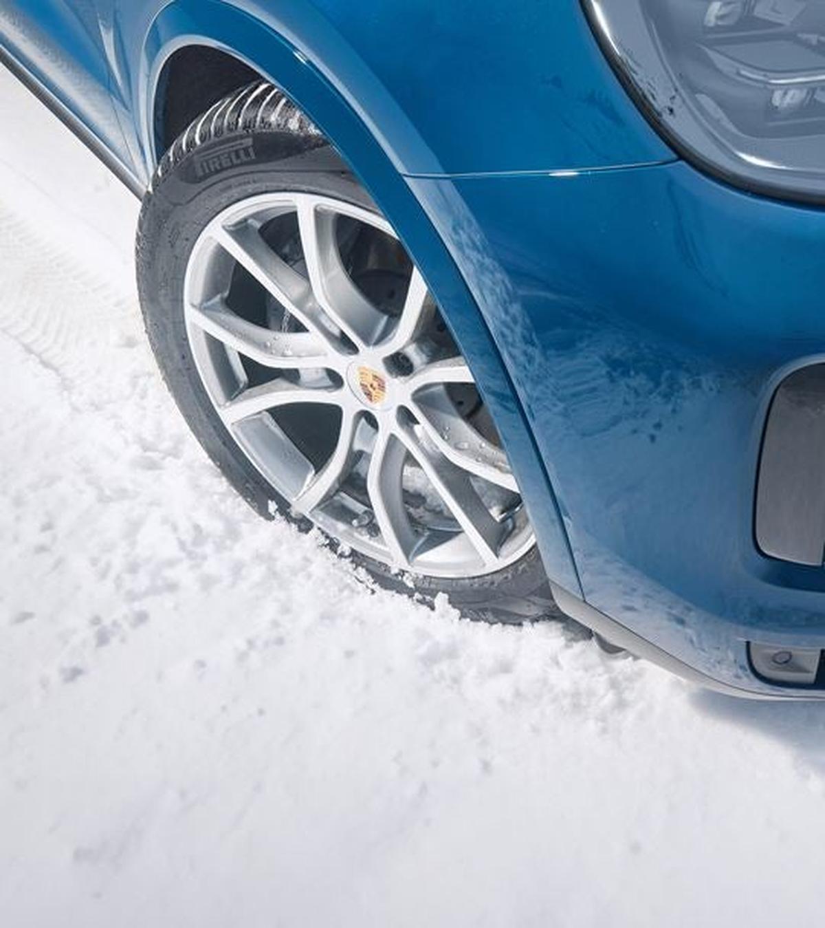 Porsche winter wheel and tire in the snow