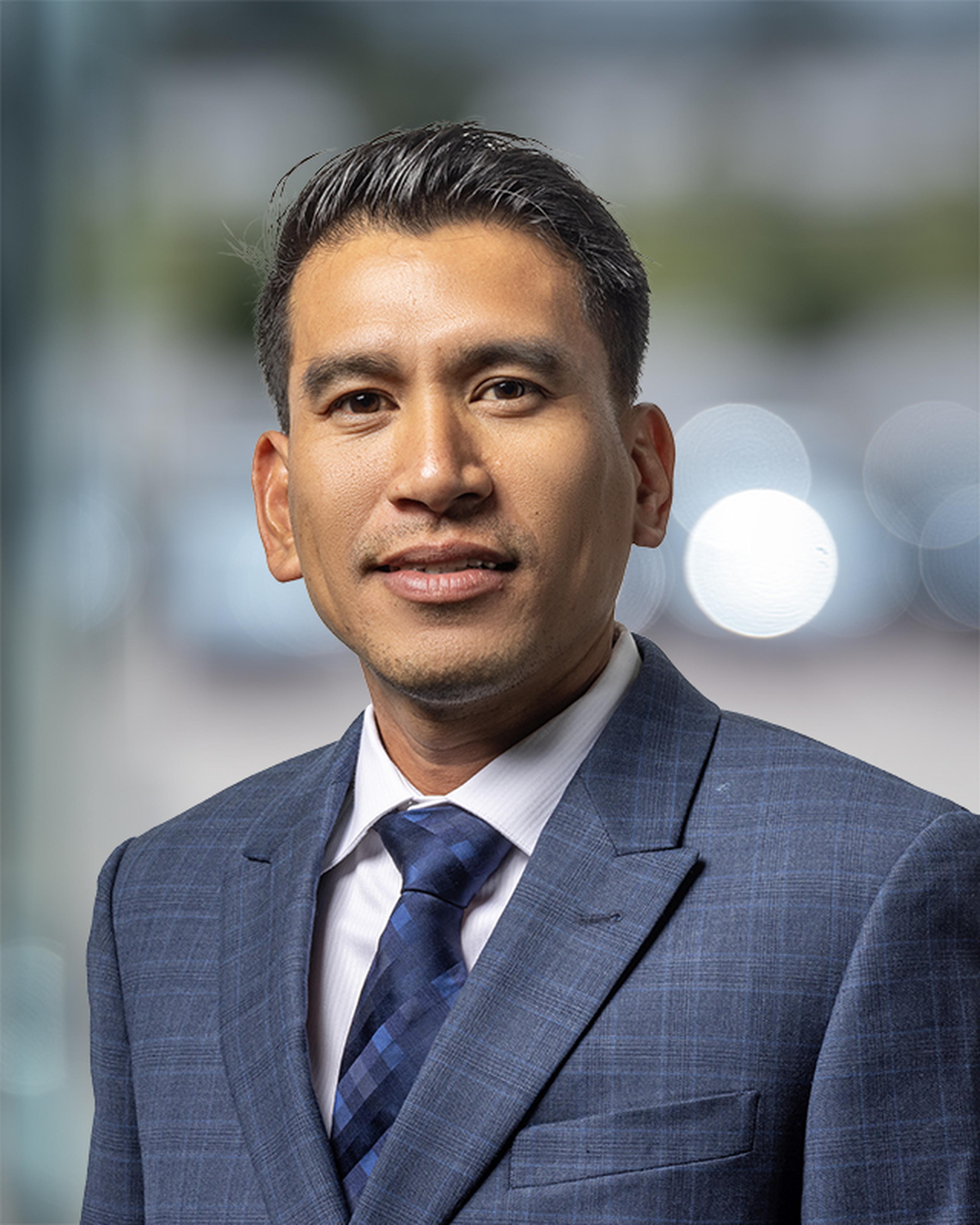 George Tenido Staff Headshot