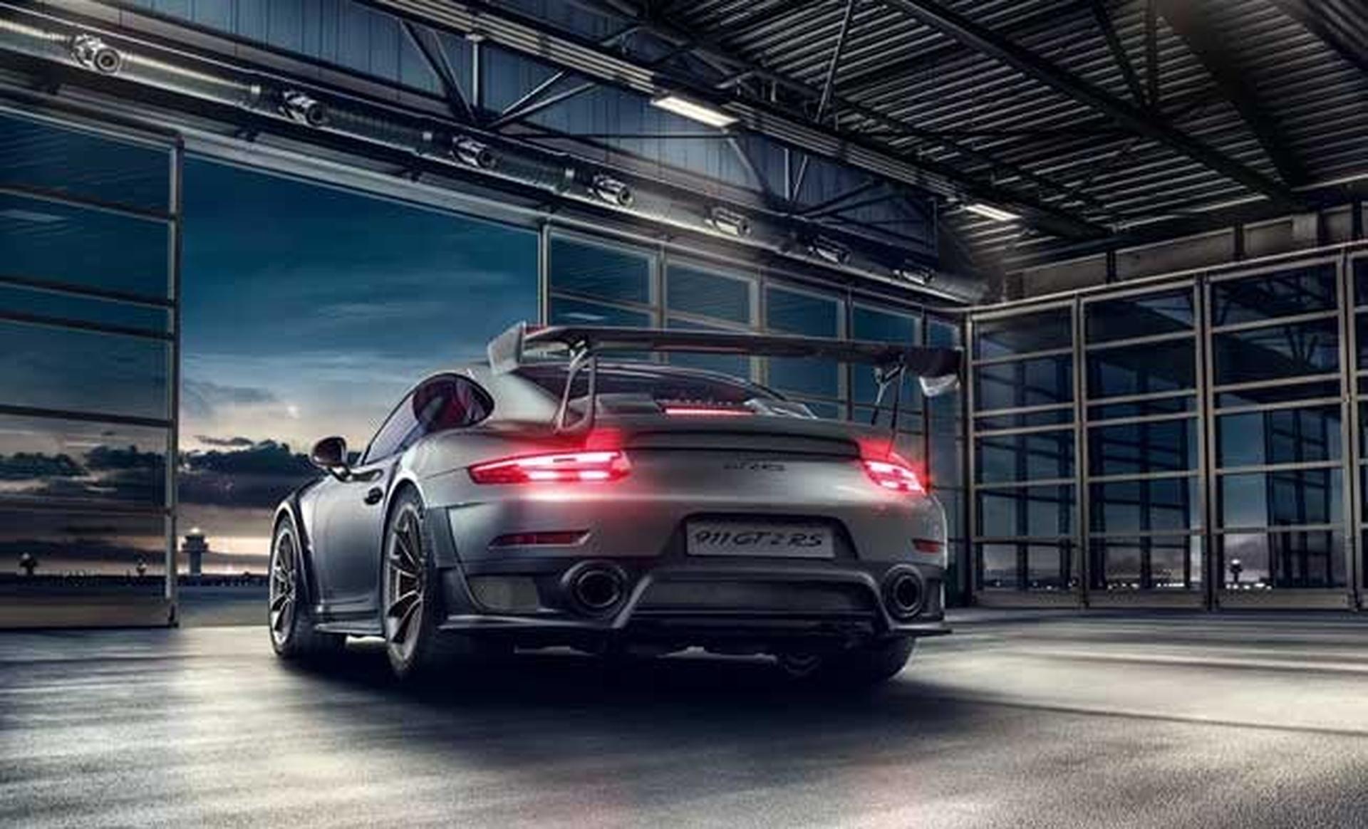 Porsche 911 GT2 RS rear view with taillights in a garage