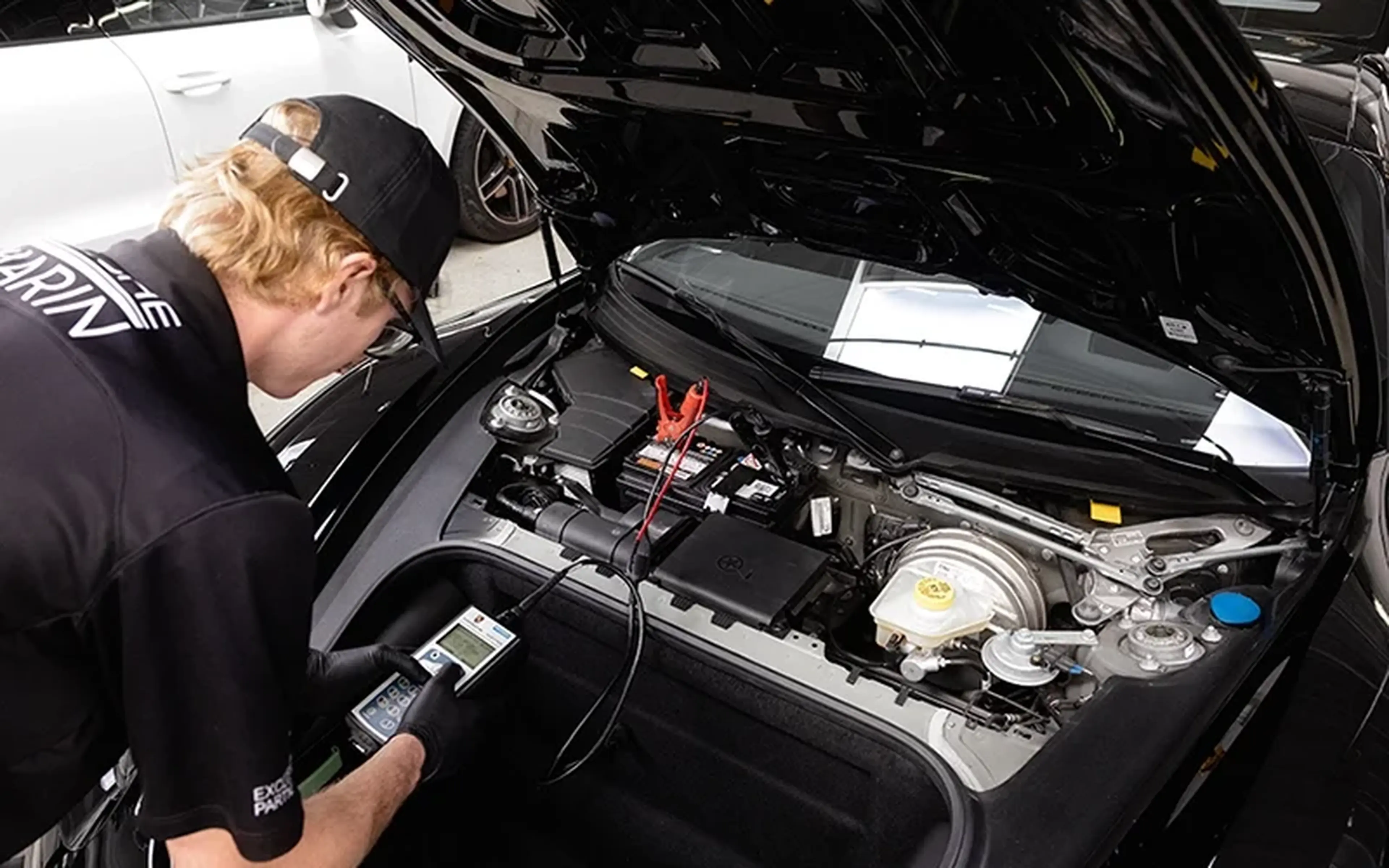 Porsche engine bay during diagnostics