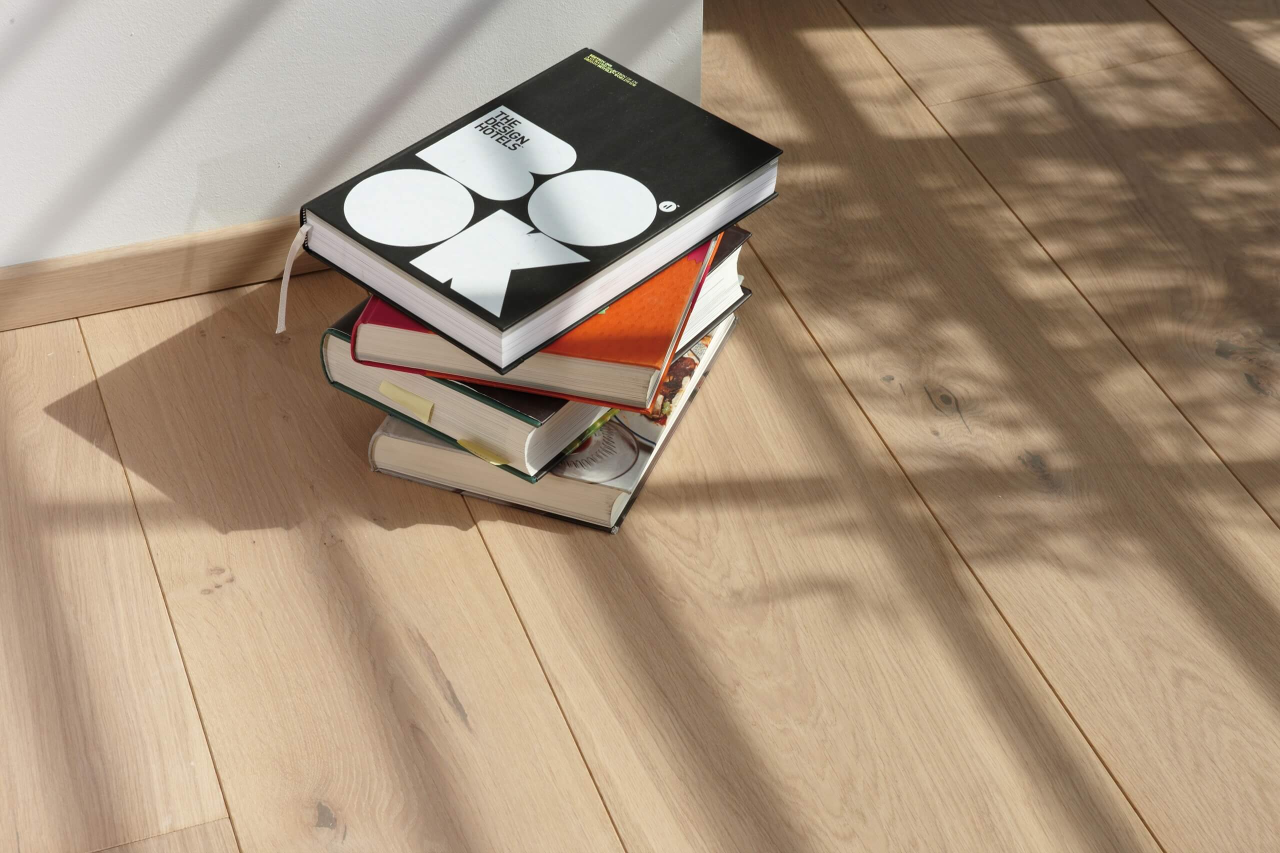 books on the wide plank chalet floors
