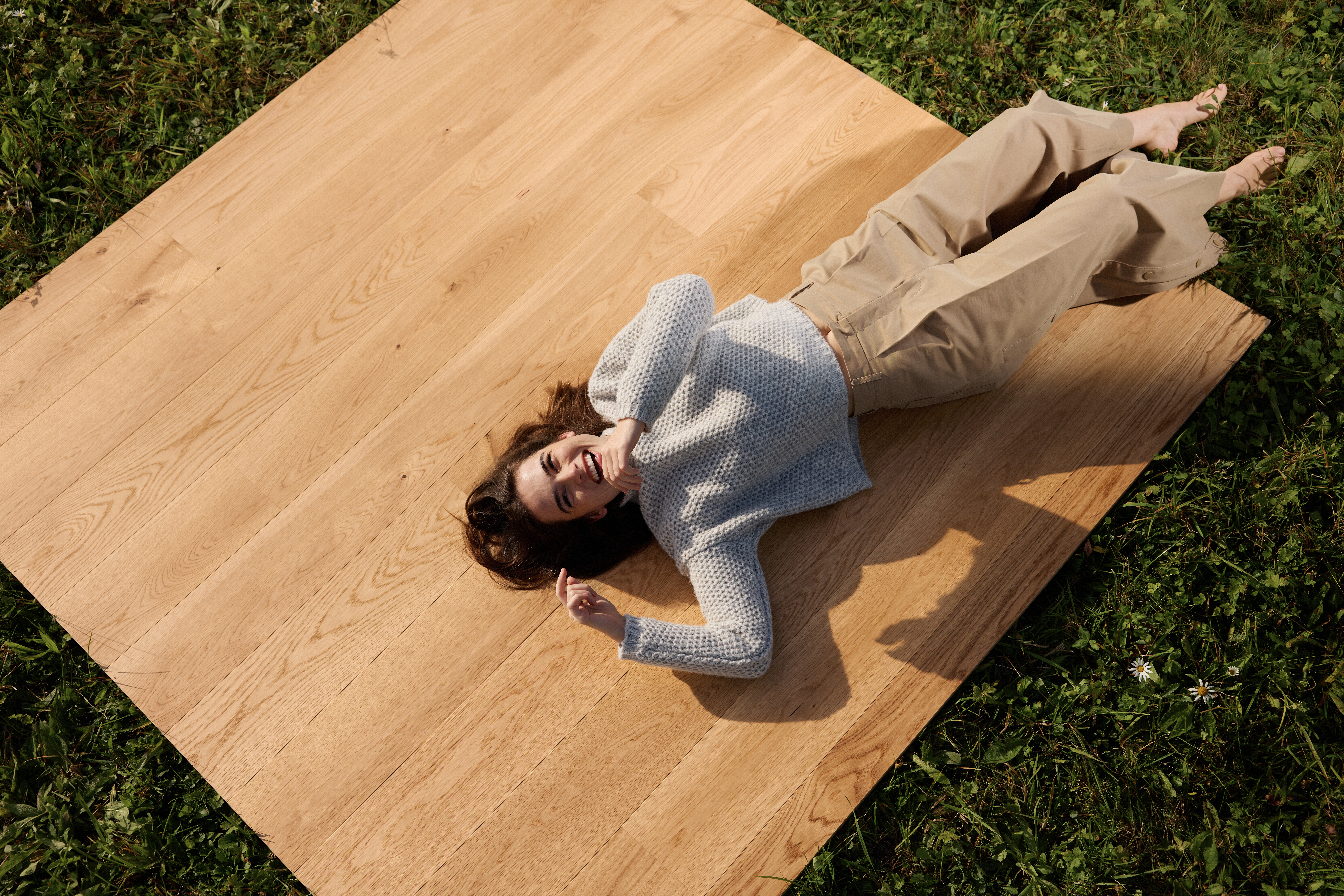 Natural wood floors placed on grass