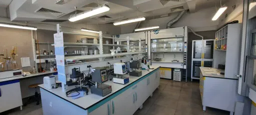 "Modern laboratory facility with scientific equipment and workstations where Scott Bader develops advanced resins and composites" [G]