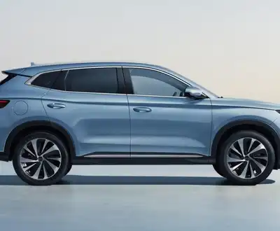 "Modern blue SUV parked by waterfront - Scott Bader composites and structural adhesives for automotive applications" [G]