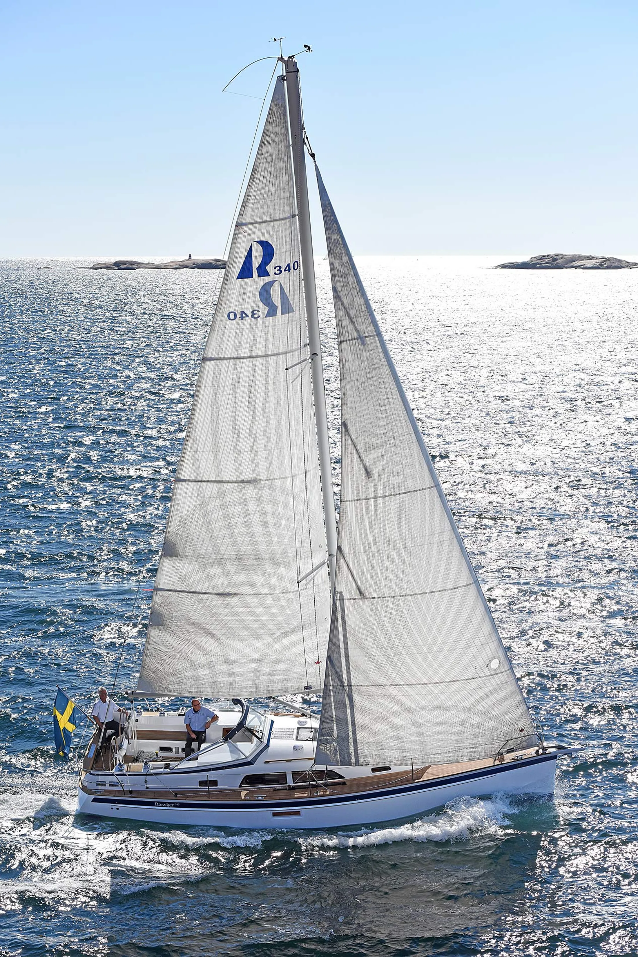 "Sailboat navigating sparkling waters, showcasing durable marine applications where Scott Bader composites and gelcoats excel" [G]
