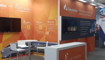 Scott Bader trade show booth featuring Crestafire resins and Crestabond structural adhesives displays [G]