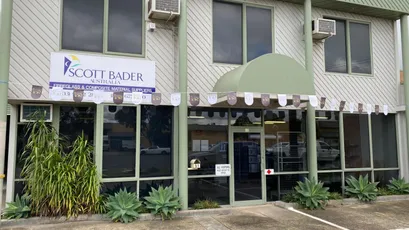 "Scott Bader office building exterior with company signage, specializing in composites, adhesives and resins" [G]