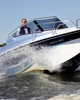 "Speedboat cruising through water, showcasing Scott Bader gelcoats and composites used in marine applications" [G]