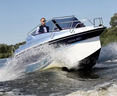 "Speedboat cruising through water, showcasing Scott Bader gelcoats and composites used in marine applications" [G]