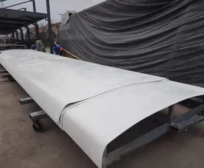 Large wind turbine blade mold showcasing Scott Bader composites and resins in manufacturing. [G]