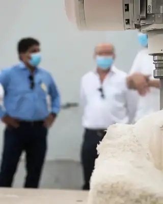 "CNC machine cutting composite material at Scott Bader facility, demonstrating precision manufacturing of advanced resins" [G]