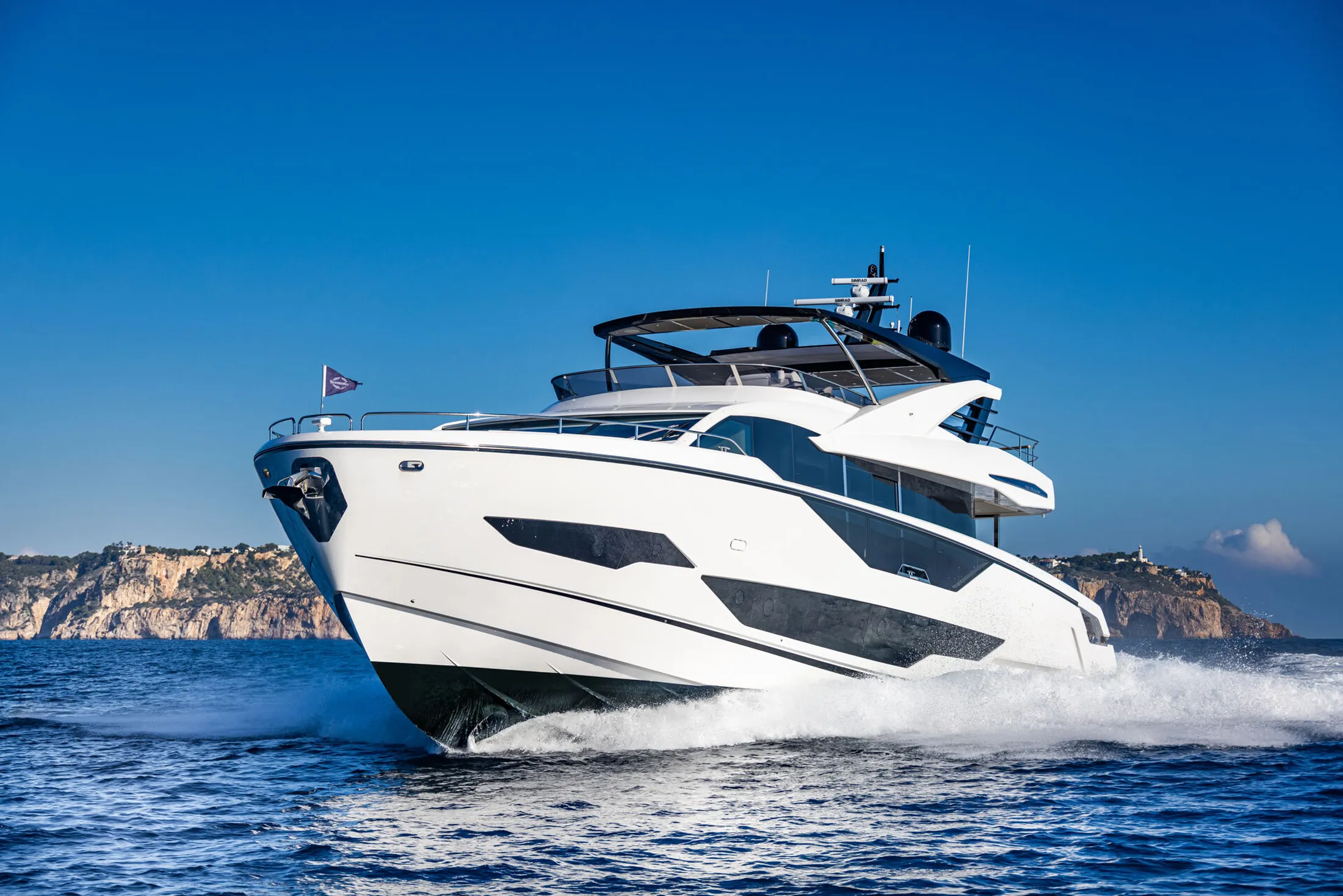 "Luxury yacht cruising on blue water - Scott Bader gelcoats and composites for superior marine performance" [G]