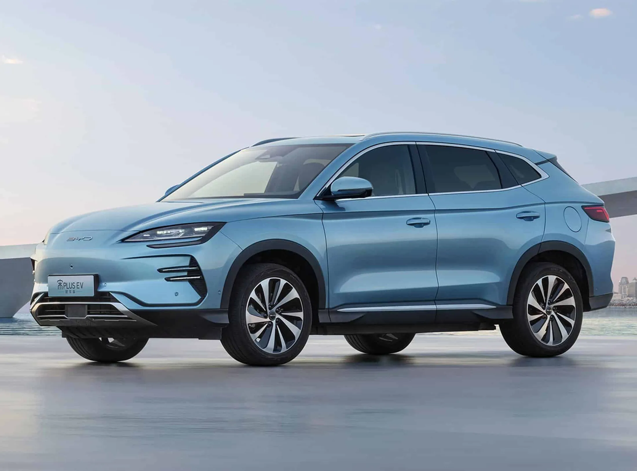 "Modern blue electric SUV vehicle on display, showcasing automotive applications of Scott Bader composites and resins" [G]