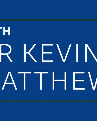 "Catch Up with Dr Kevin Matthews" - Scott Bader corporate communication banner on blue background with quotation mark graphic [G]
