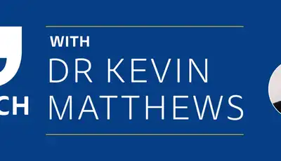 "Catch Up with Dr Kevin Matthews" - Scott Bader corporate communication banner on blue background with quotation mark graphic [G]