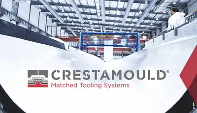"Industrial manufacturing facility with large curved composite molds by Crestamould, showcasing Scott Bader resins for precision tooling systems" [G]