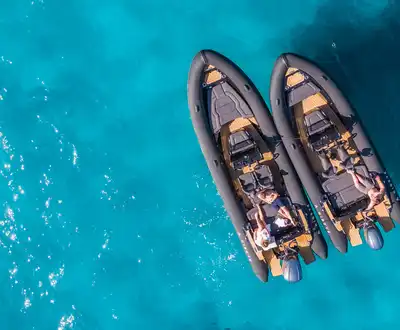 "Aerial view of luxury boats on turquoise water - Scott Bader gelcoats and composites for marine applications" [G]