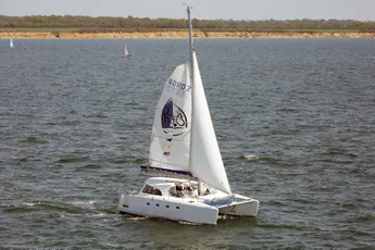 Sailing catamaran on water, built with Scott Bader gelcoats and composites for marine applications [G]