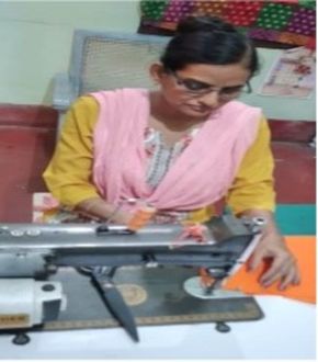 Person operating a sewing machine with colorful fabric materials in a workshop environment [G]