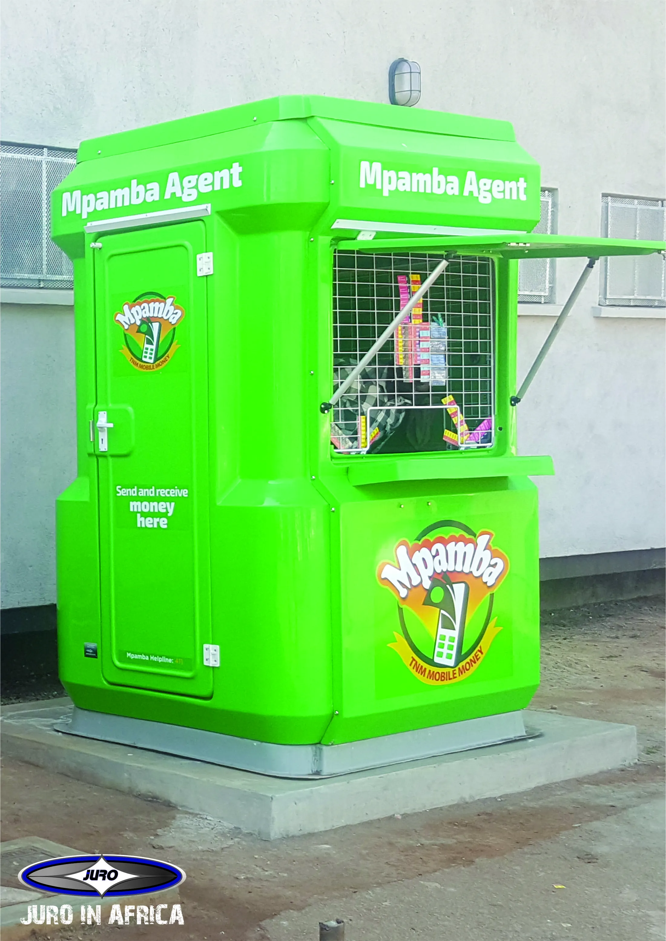 "Bright green Mpamba Agent kiosk for mobile money services, with service window and branding" [G]