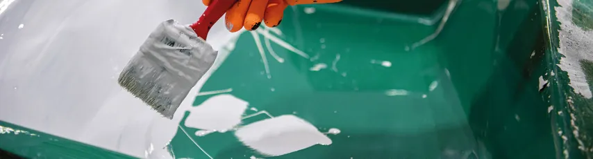 "Application of Scott Bader gelcoats on a green surface, showcasing smooth coating process for composite materials" [G]