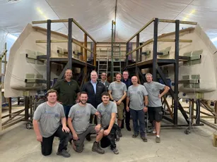 Boatbuilding team with hull moulds using Scott Bader composites and gelcoats in marine manufacturing [G]