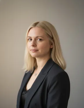 Professional portrait of a Scott Bader team member in corporate attire. [G]