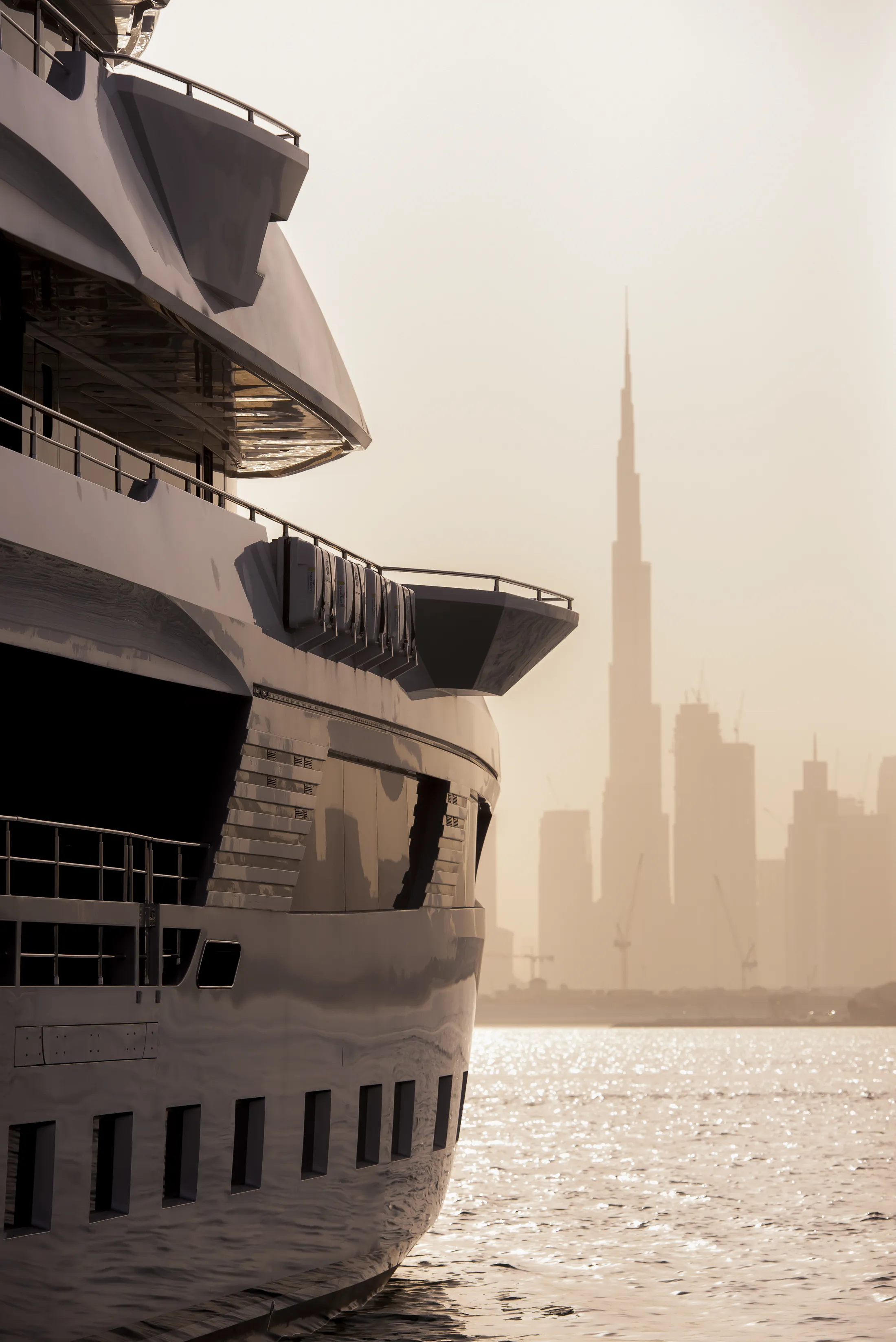 "Luxury yacht with Scott Bader composites and gelcoats showcasing durability in marine applications against Dubai skyline" [G]