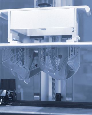 "Industrial manufacturing equipment processing composite materials for Scott Bader structural adhesives production" [G]