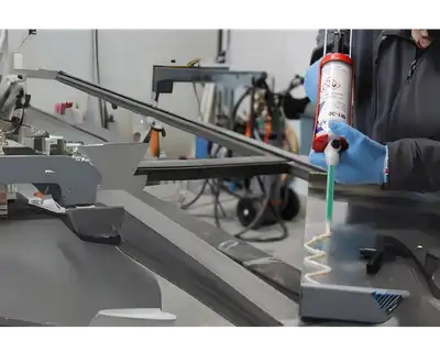 "Technician applying Scott Bader structural adhesives in precision manufacturing process for composite materials assembly" [G]