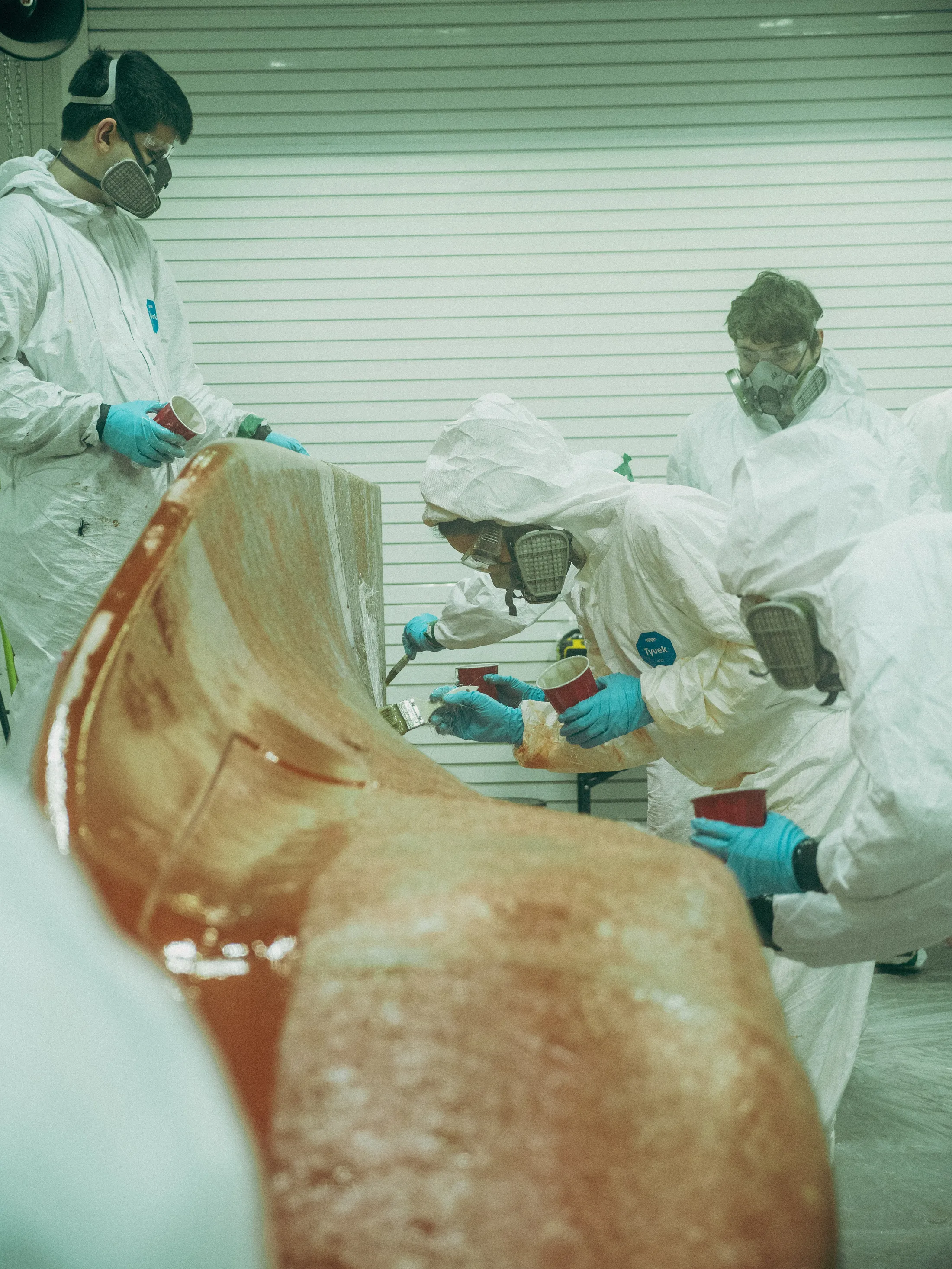 Workers applying Scott Bader resins and gelcoats during composite mould manufacturing process [G]