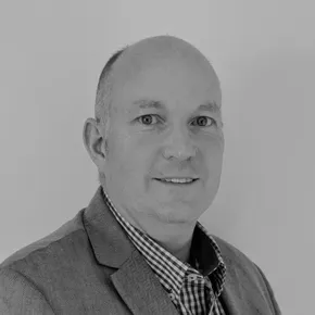 "Professional headshot of a Scott Bader team member in business attire against a neutral background" [G]