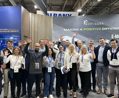"Scott Bader team at industry exhibition showcasing composites and resins for e-mobility applications" [G]