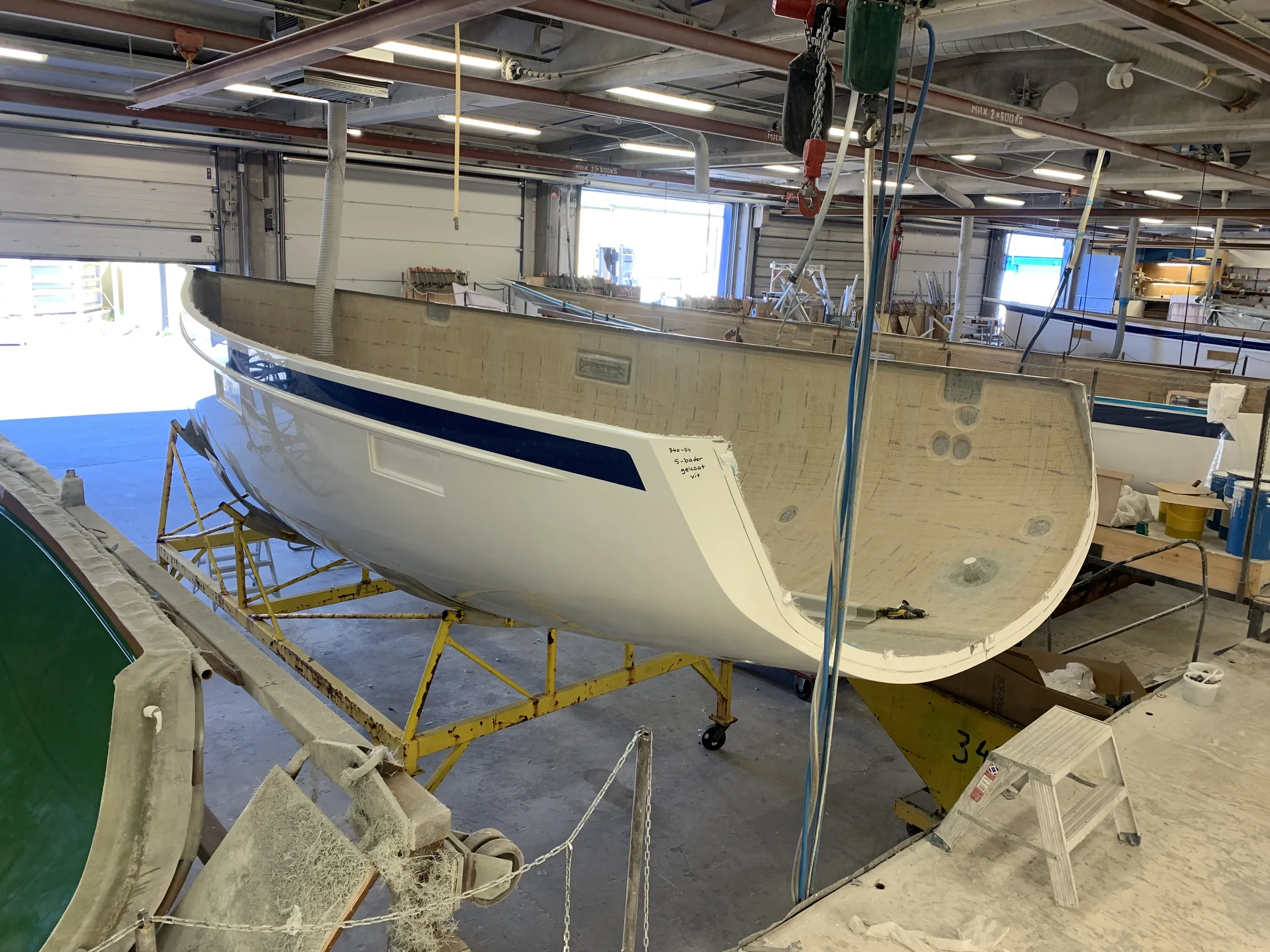 "Boat hull manufacturing using Scott Bader gelcoats and composites for marine applications in production facility" [G]