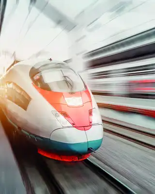 "High-speed train in motion with motion blur effect, showcasing transportation applications where Scott Bader composites enhance performance" [G]