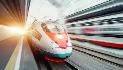 "High-speed train in motion with motion blur effect, showcasing transportation applications where Scott Bader composites enhance performance" [G]
