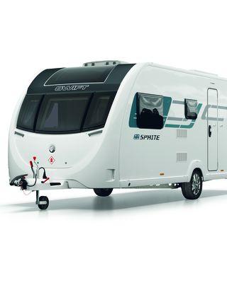 "Modern white caravan trailer with black front panel on white background" [G]
