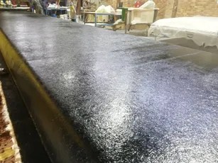 Large composite mould coated with Scott Bader gelcoat during manufacturing process [G]