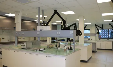 "Modern laboratory with articulated extraction arms for Scott Bader resins and composites manufacturing and testing" [G]