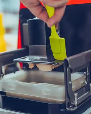 "Laboratory technician using specialized equipment for testing Scott Bader resins and composites for quality control" [G]
