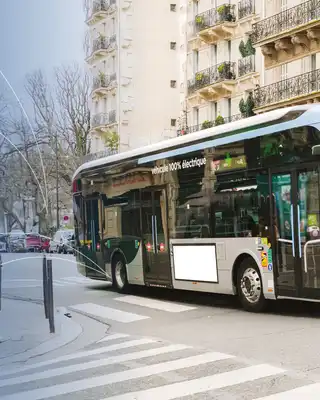 "Modern public transit bus on urban street with Scott Bader composites used in transportation applications" [G]