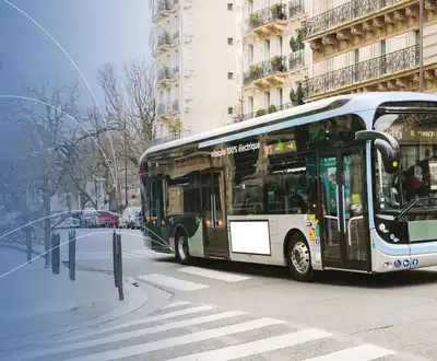 "Modern public transit bus on urban street with Scott Bader composites used in transportation applications" [G]