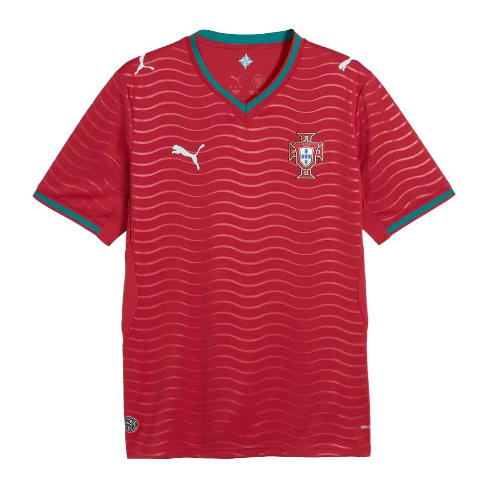 Red soccer jersey with white wavy stripes, featuring a crest and Puma logos. Green accents on sleeves and collar.