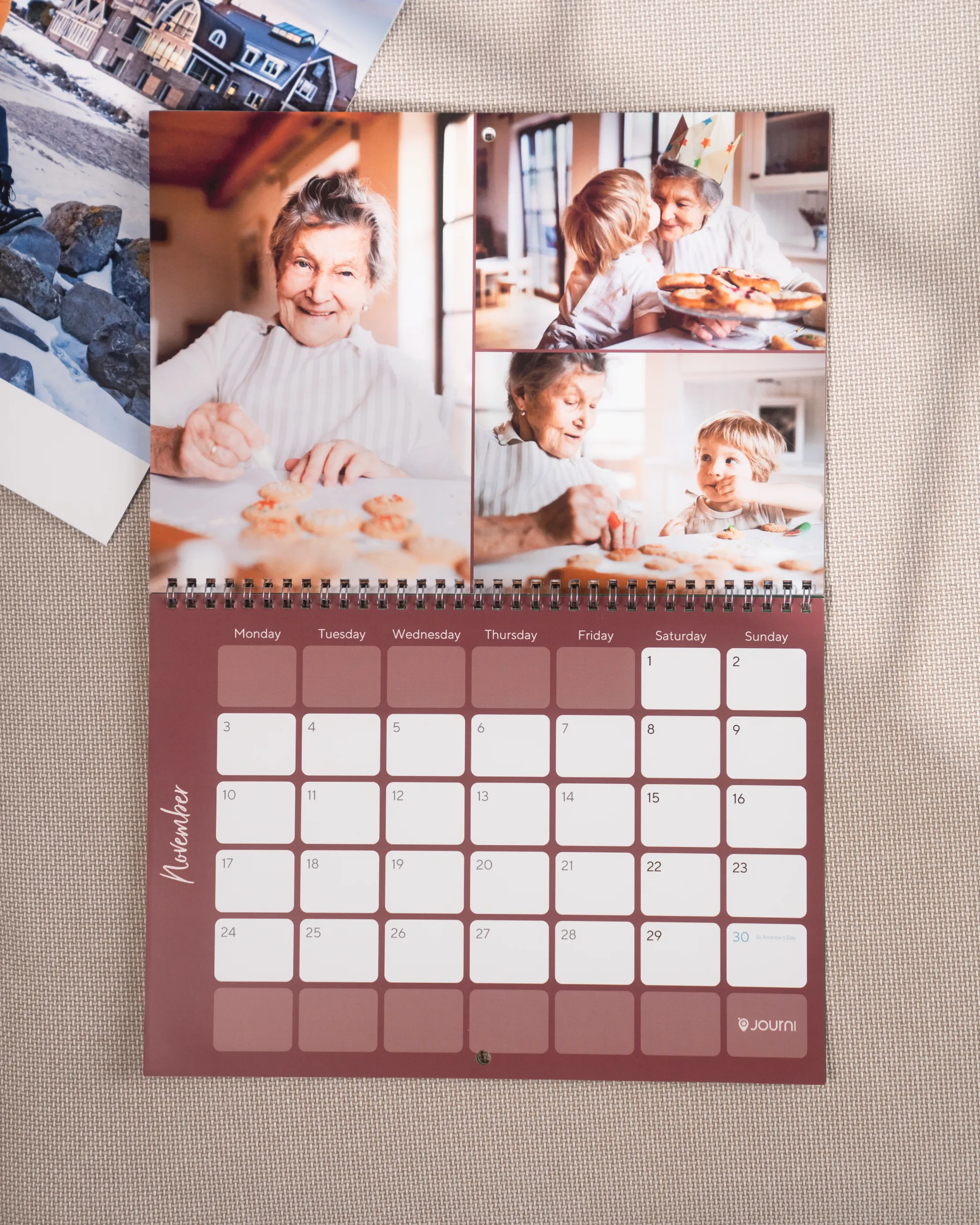 Open calendar showing November, with photos of a smiling elderly woman baking with a child.