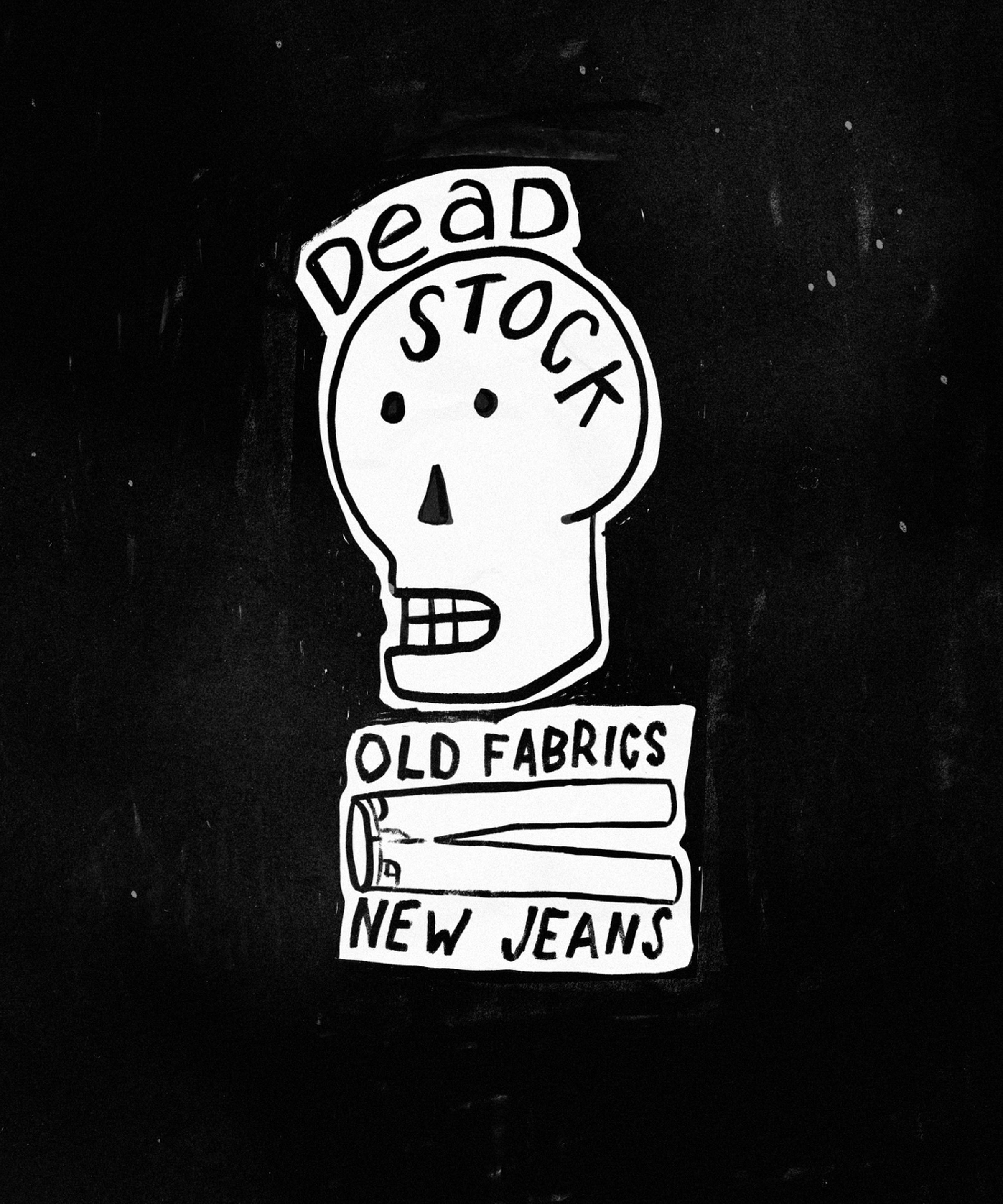 Black and white illustration of a skull with text: "Dead Stock, Old Fabrics, New Jeans" on a black background.