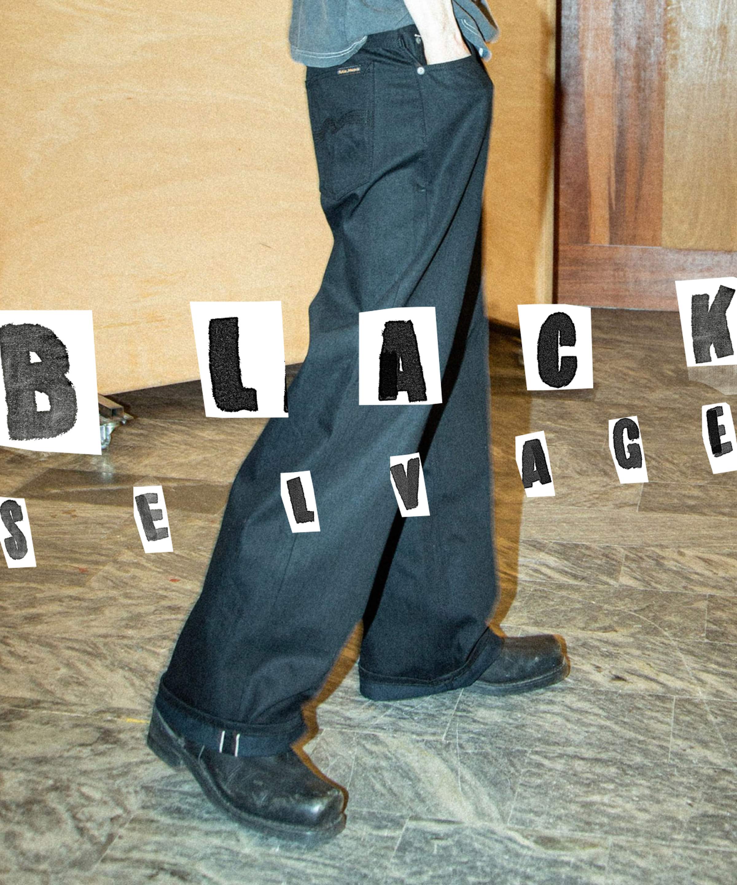 Nudie Jeans Black Selvedge wide-leg jeans on model with black boots, "Black Selvedge" cut-out lettering.