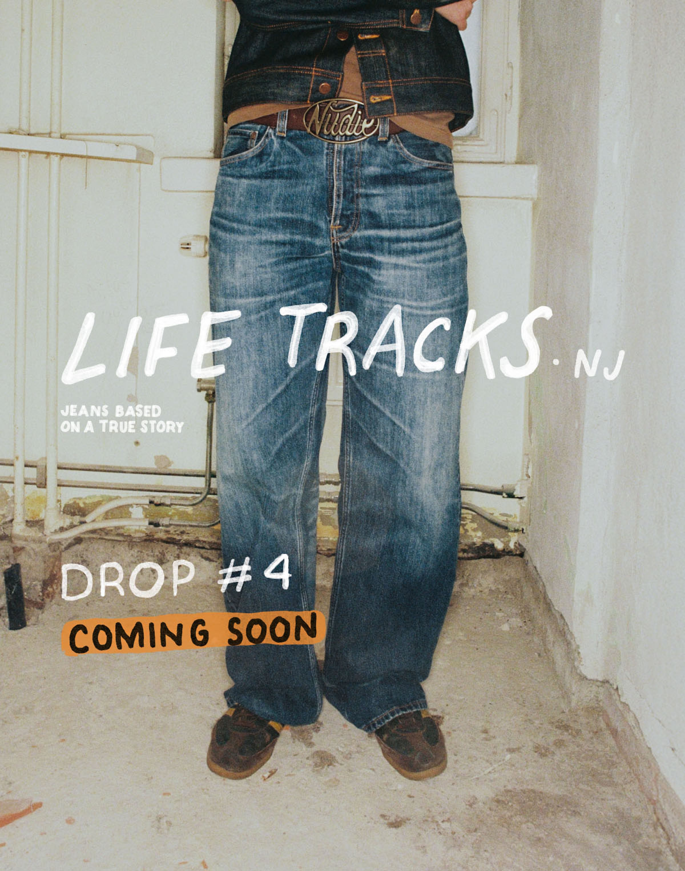 Person wearing blue jeans and a denim jacket, standing indoors. Text reads "Life Tracks NJ, Drop #4 Coming Soon."