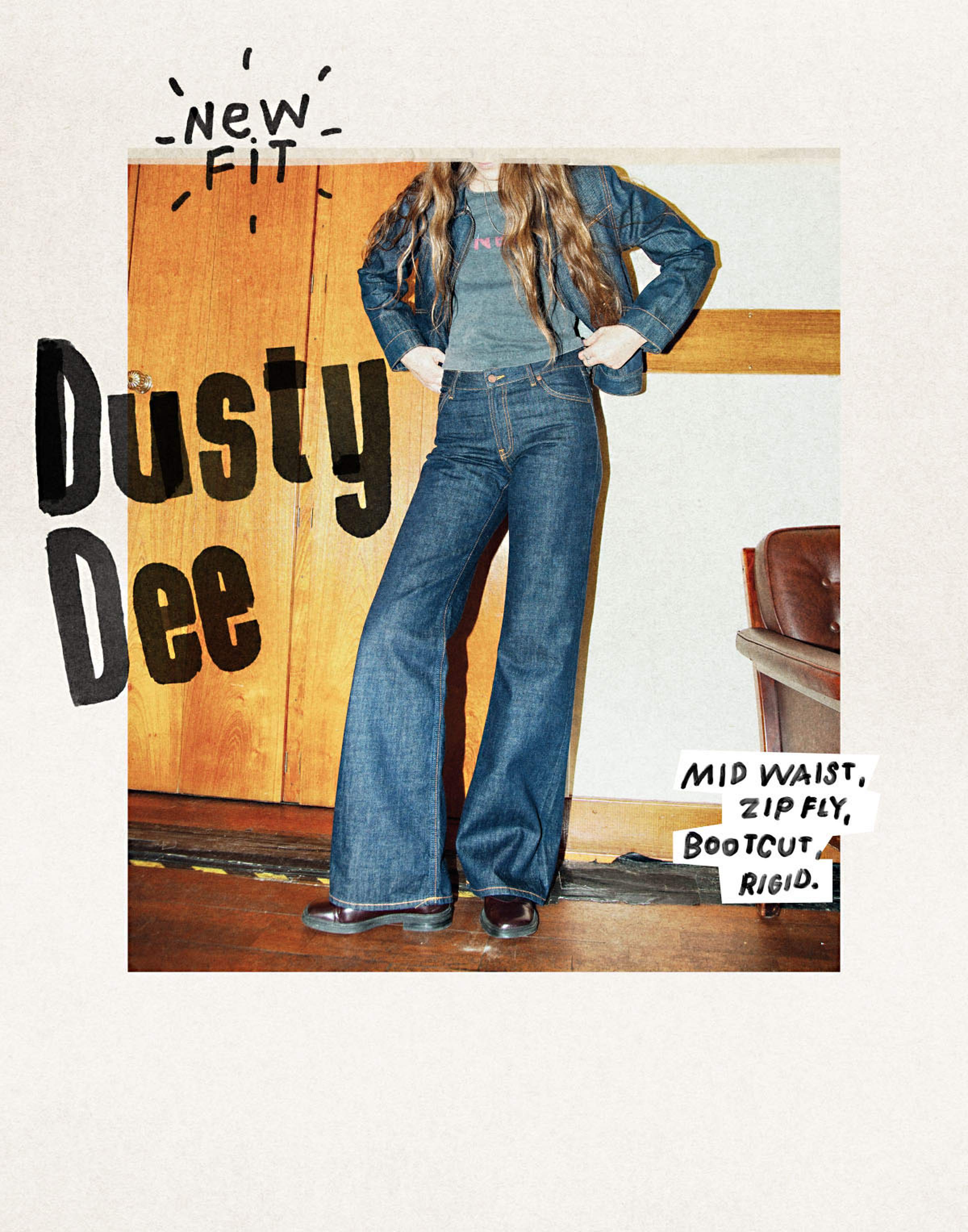 Person wearing a denim jacket and flared jeans, standing indoors. Text reads "New Fit Dusty Dee," "Mid Waist, Zip Fly, Bootcut, Rigid."
