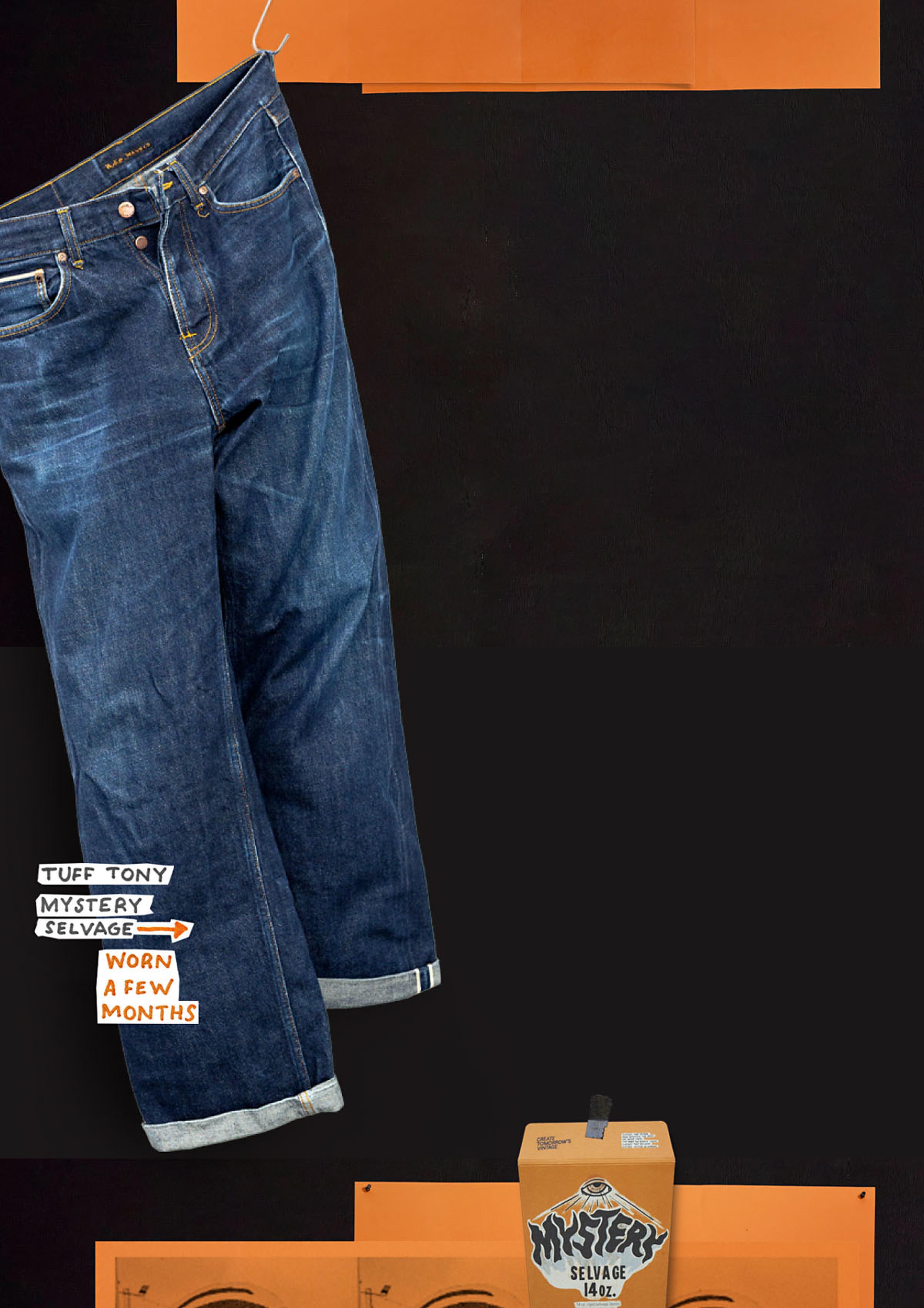 Blue jeans hanging against a black and orange background, with a small box labeled "Mystery Selvage" below.